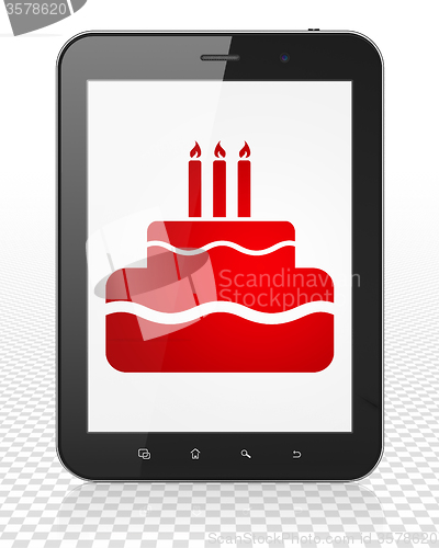 Image of Entertainment, concept: Tablet Pc Computer with Cake on display