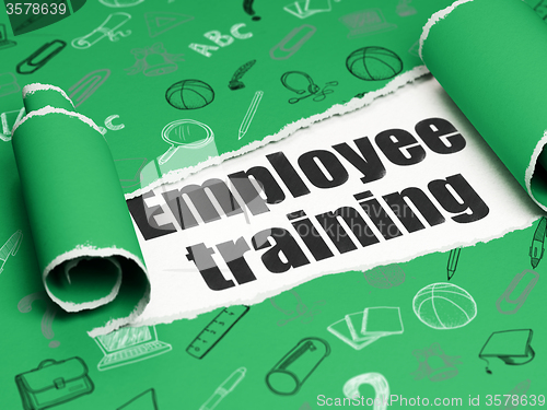 Image of Studying concept: black text Employee Training under the piece of  torn paper