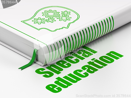 Image of Learning concept: book Head With Gears, Special Education on white background