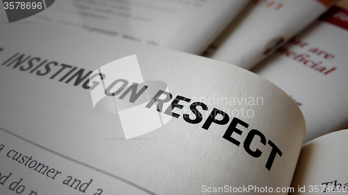 Image of Insisting on respect word on a book