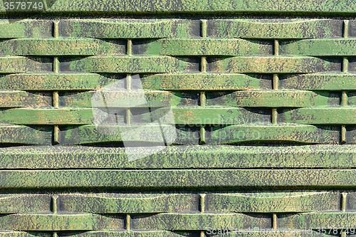 Image of Old rusty green corrugated metal wall