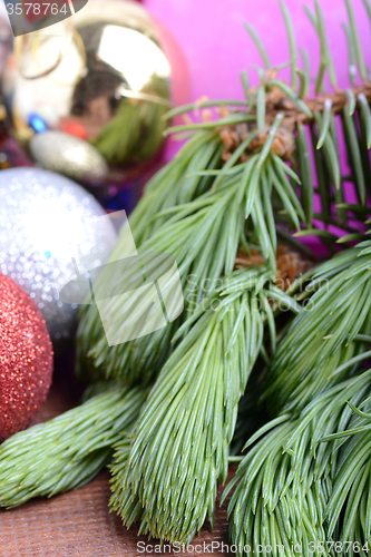 Image of Decorated christmas tree - holiday background, green tree eve branch close up with christmas balls 