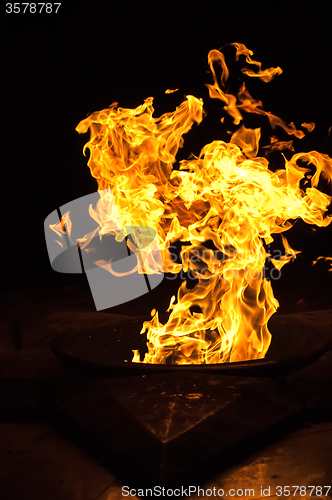 Image of Red flames on black background.