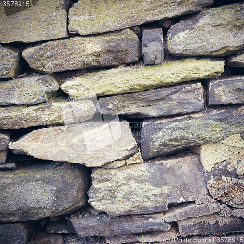 Image of Old stone wall with moss and lichen