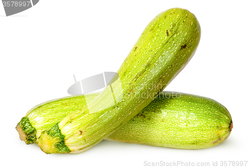 Image of Two fresh courgette crisscross