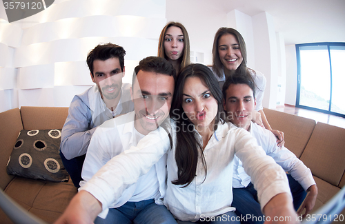 Image of group of friends taking selfie