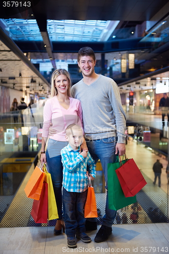 Image of young family with shopping bags