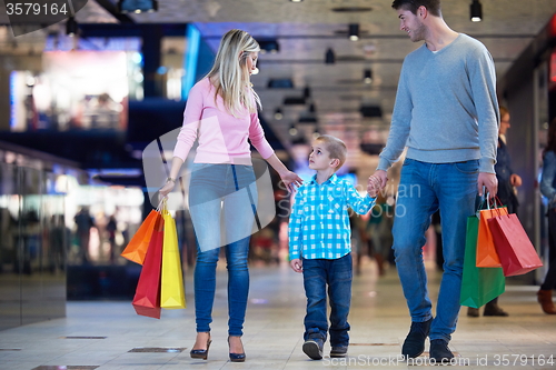 Image of young family with shopping bags