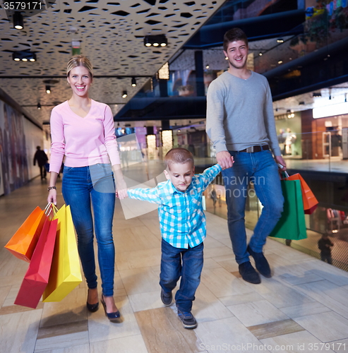 Image of young family with shopping bags