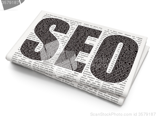 Image of Web design concept: SEO on Newspaper background