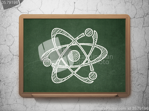 Image of Science concept: Molecule on chalkboard background
