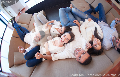 Image of friends group get relaxed at home