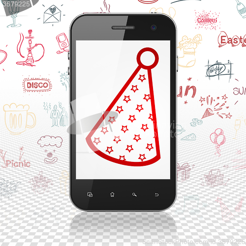 Image of Holiday concept: Smartphone with Party Hat on display