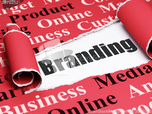 Image of Advertising concept: black text Branding under the piece of  torn paper