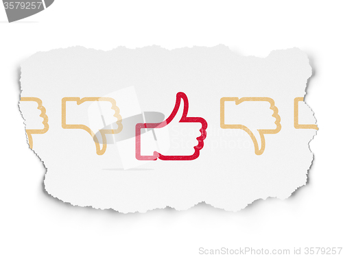 Image of Social network concept: thumb up icon on Torn Paper background