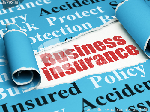 Image of Insurance concept: red text Business Insurance under the piece of  torn paper