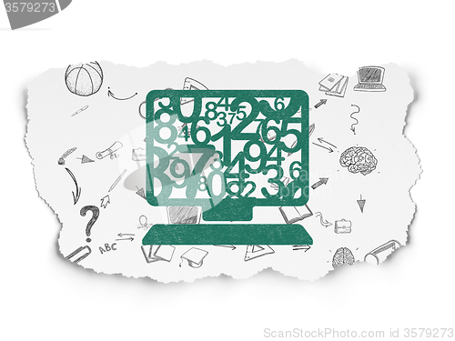 Image of Studying concept: Computer Pc on Torn Paper background