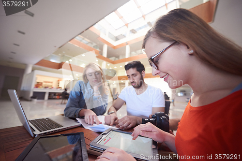 Image of students group working on school  project  together