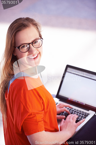 Image of student girl with laptop computer