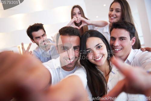 Image of group of friends taking selfie