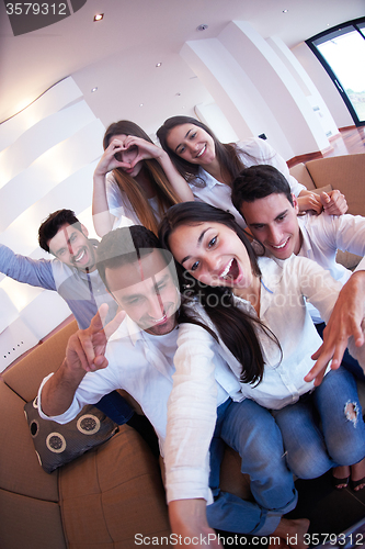 Image of group of friends taking selfie