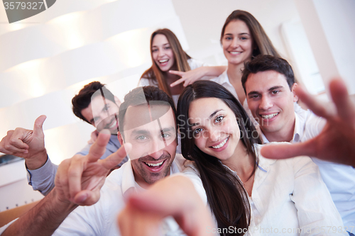Image of group of friends taking selfie
