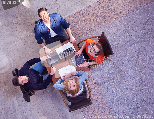 Image of students group working on school  project  together