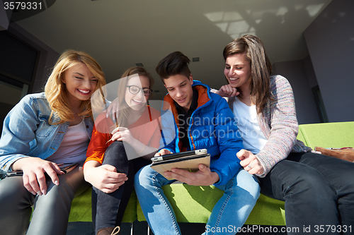 Image of students group working on school  project  together