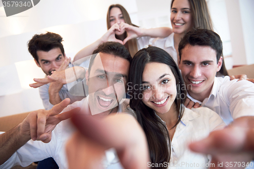 Image of group of friends taking selfie