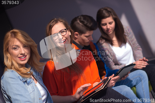 Image of students group working on school  project  together