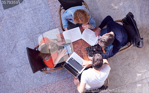 Image of students group working on school  project  together