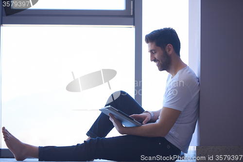Image of student working on tablet