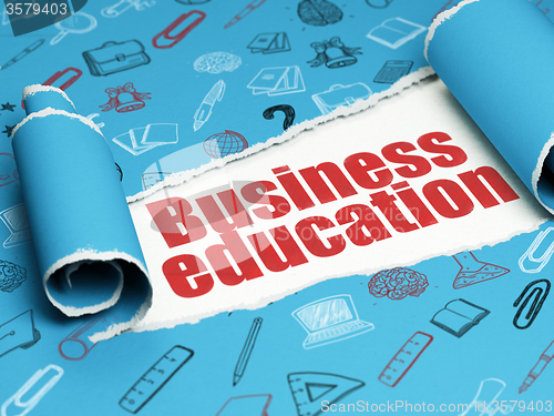 Image of Education concept: red text Business Education under the piece of  torn paper