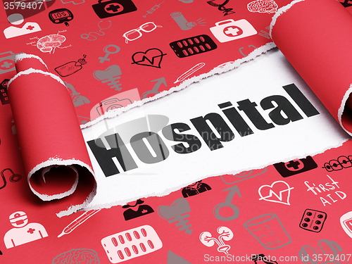 Image of Health concept: black text Hospital under the piece of  torn paper