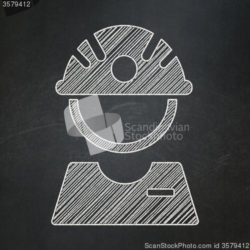 Image of Manufacuring concept: Factory Worker on chalkboard background