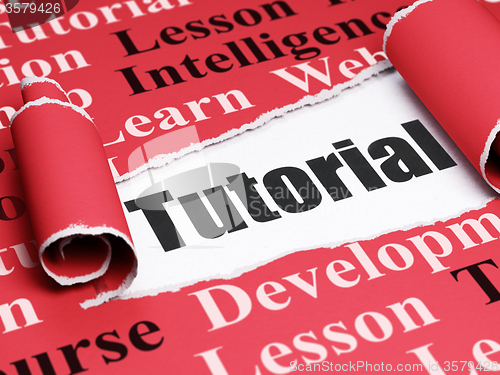 Image of Learning concept: black text Tutorial under the piece of  torn paper