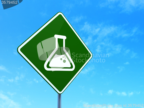 Image of Science concept: Flask on road sign background