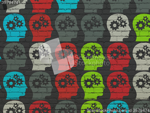 Image of Studying concept: Head With Gears icons on wall background