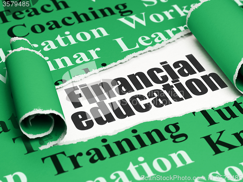 Image of Learning concept: black text Financial Education under the piece of  torn paper
