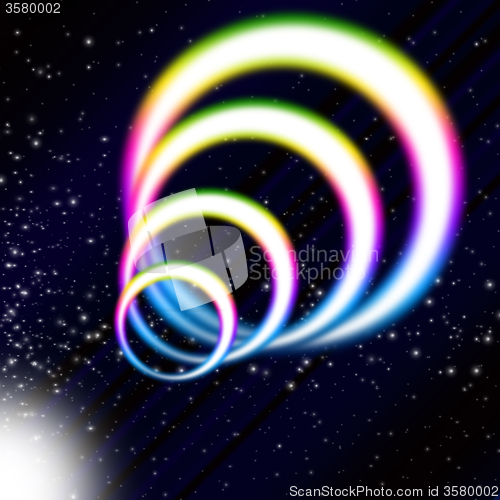 Image of Rainbow Coil Background Means Colorful Rings And Starry Sky\r