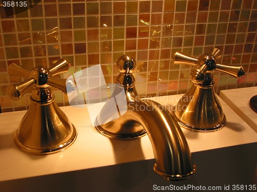 Image of Brass faucet bathroom