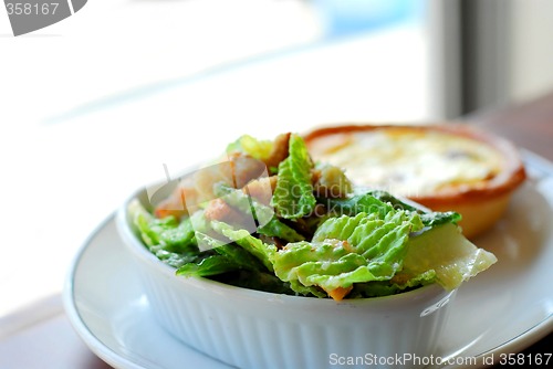 Image of Caesar salad and quiche