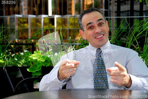 Image of Businessman talking