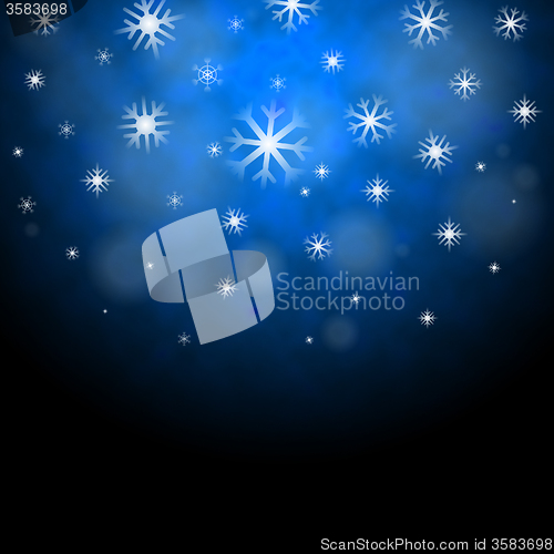 Image of Snowflakes Blue Background Shows Frozen Shiny Stars\r