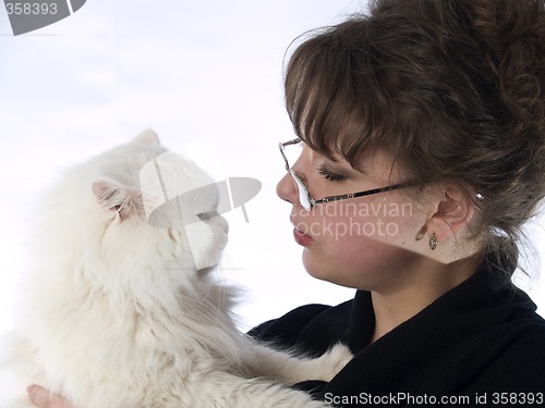 Image of Young Lady in glasses holding cat