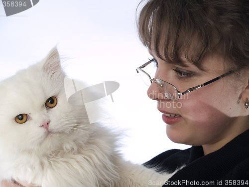 Image of Young Lady in glasses holding cat