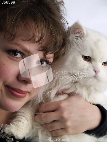 Image of Young Lady holding white cat