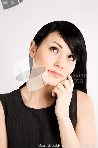 Image of Thinking businesswoman