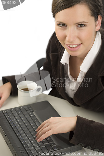 Image of Young woman and computer