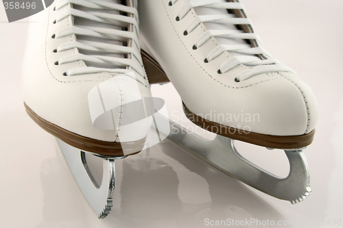 Image of A pair of white figure skates